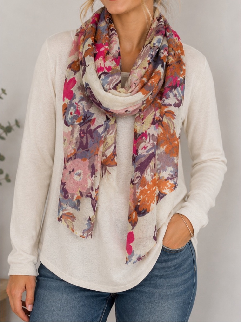 Colorful floral scarf featuring an ivory/cream background, vibrant floral print
